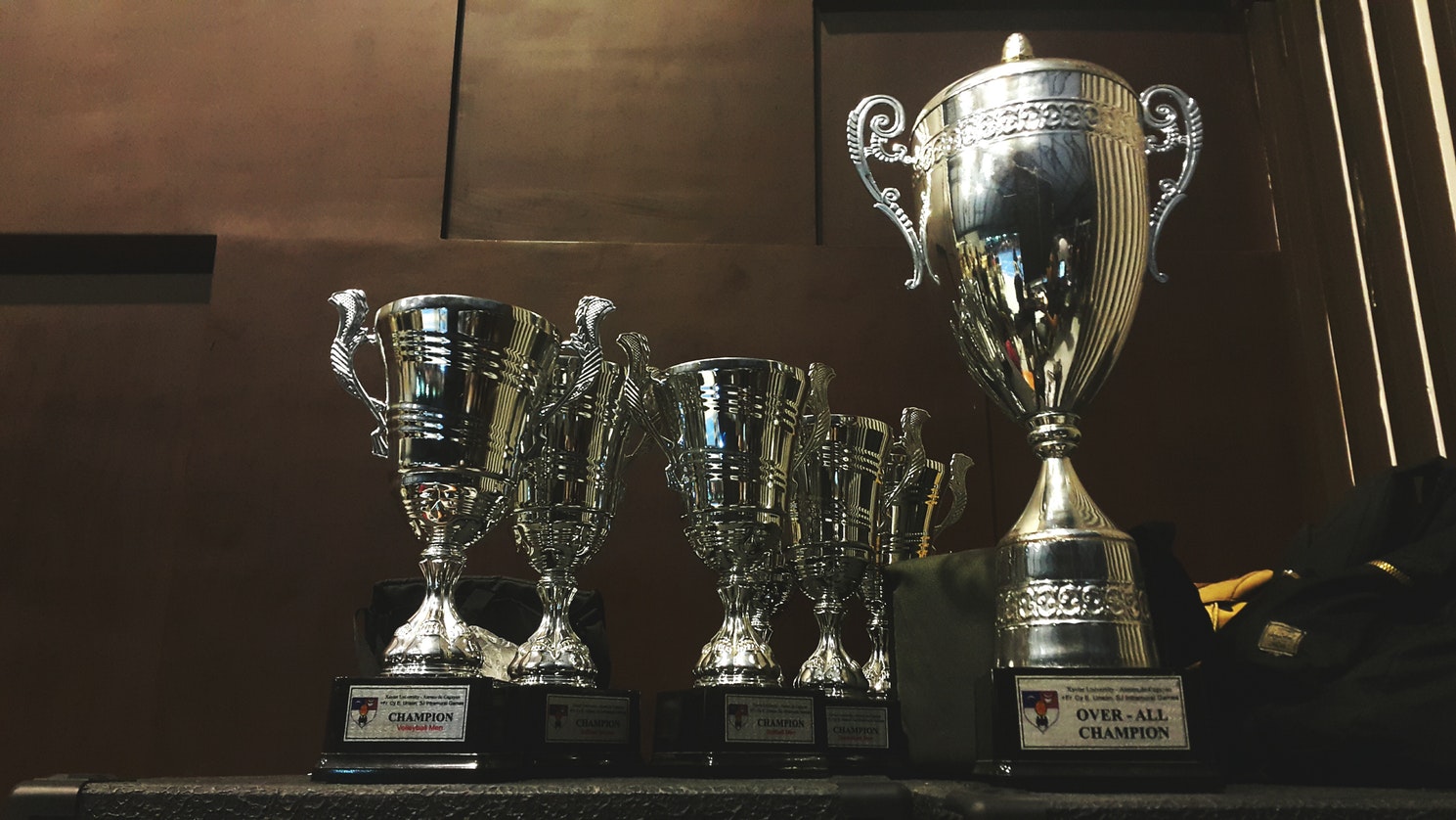 6 silver award trophies
